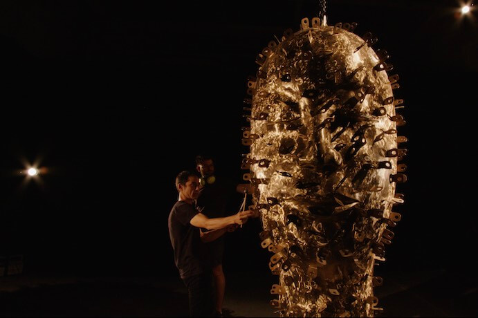 Andy Akiho plays a sculpture by Jun Kaneko -- Photo by Casey Wood